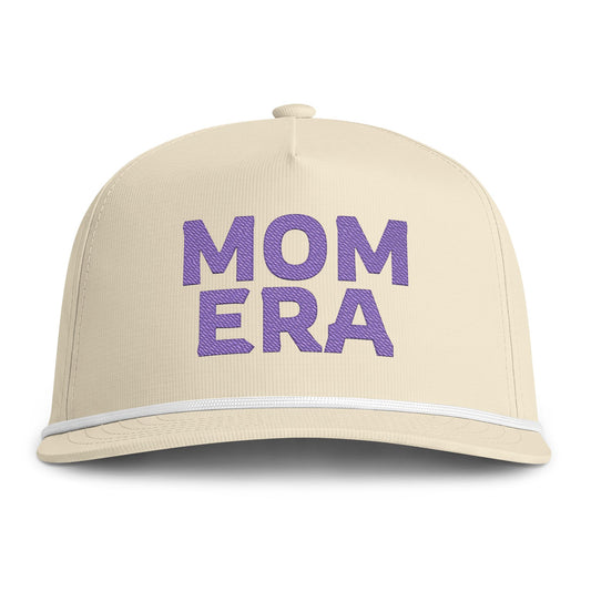 Image of an ivory hat with Purple embroidery reading "Mom Era"