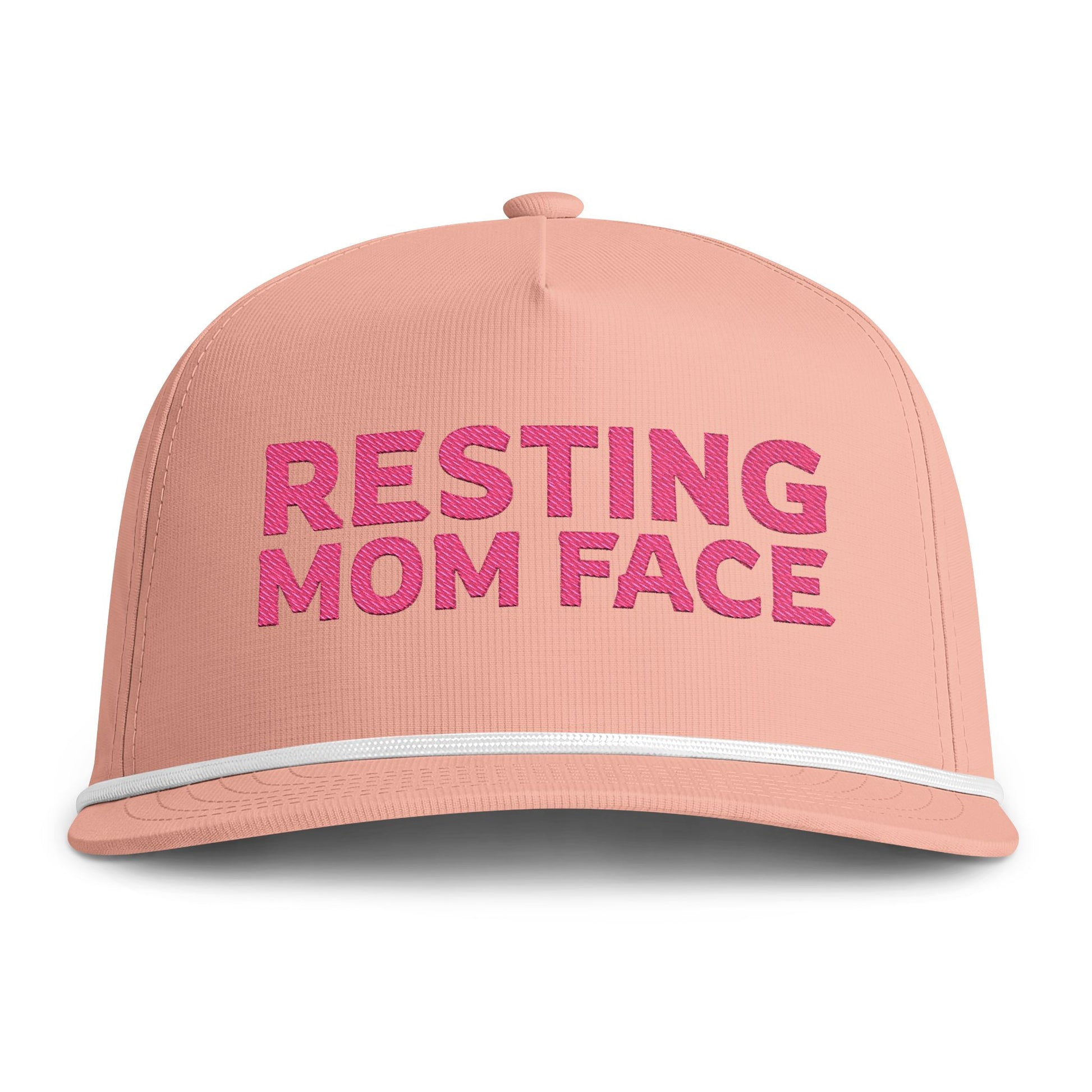 Image of a peach hat with pink embroidery reading "Resting Mom Face"